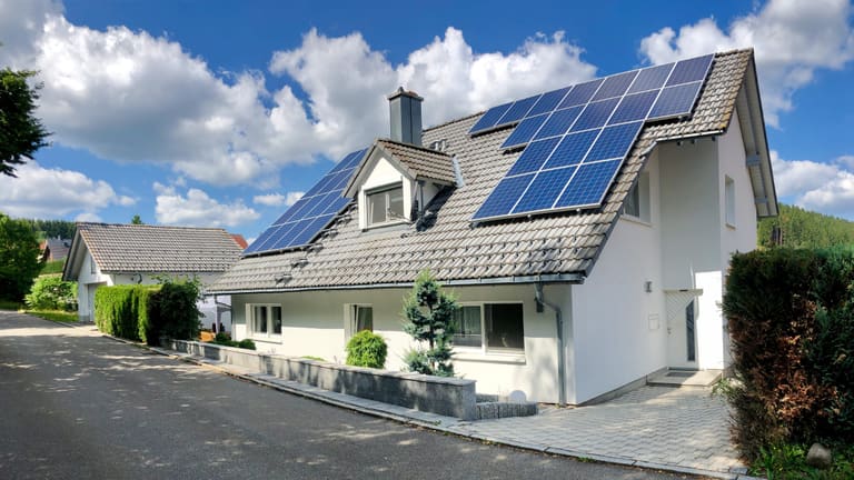 The Ferienwohnung Brigach house with solar panels on the roof on a sunny summer day